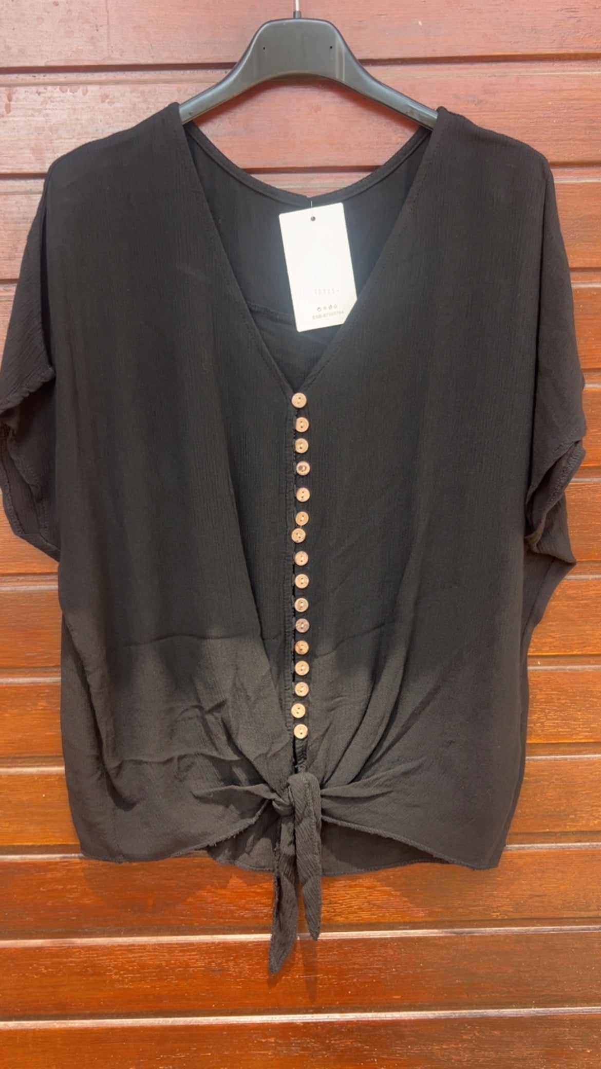 Blusa negra botones