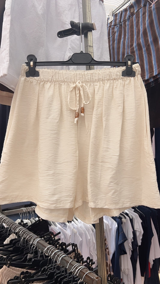Pantalón corto beige