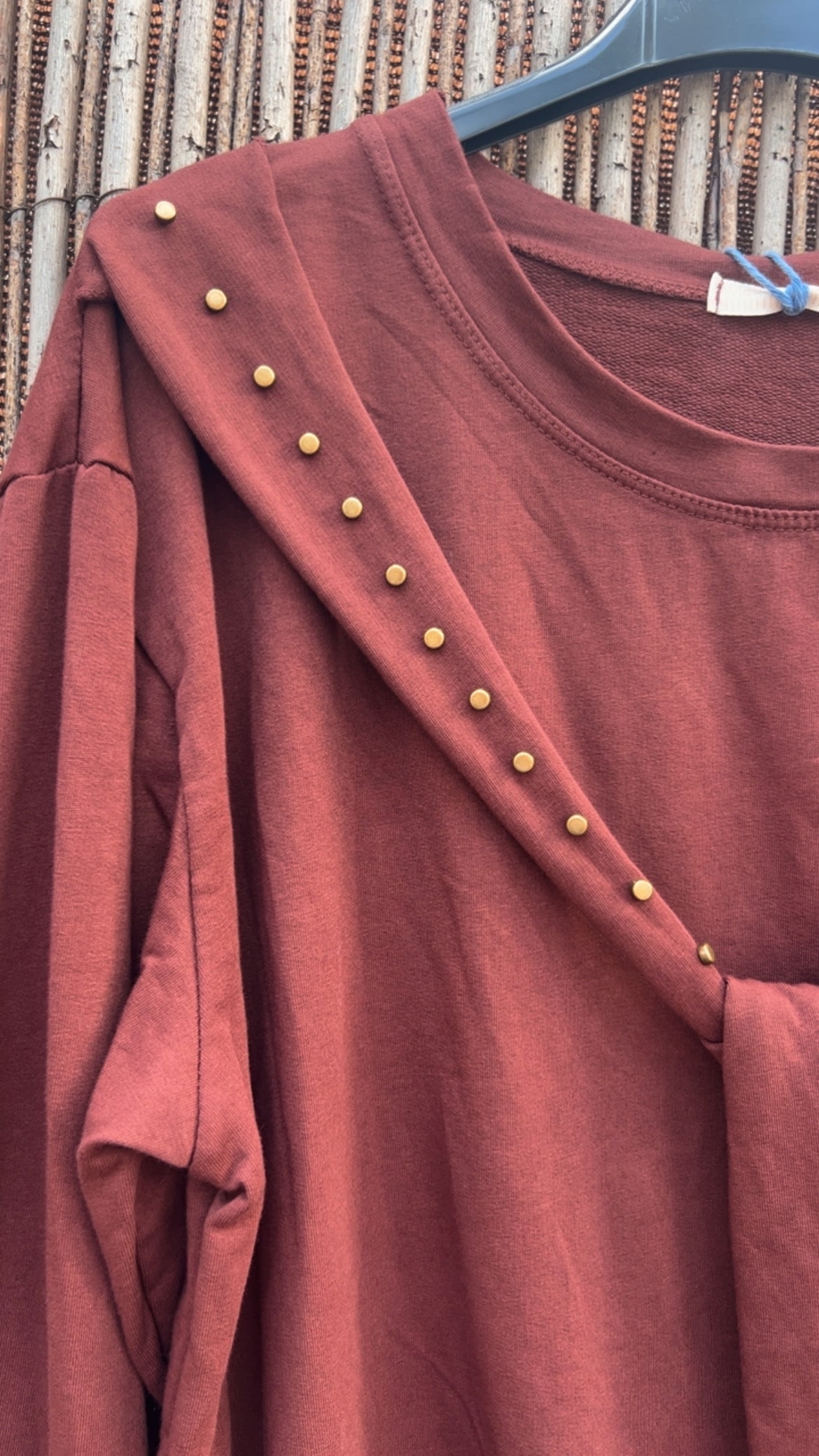 Sudadera caldera tachuelas