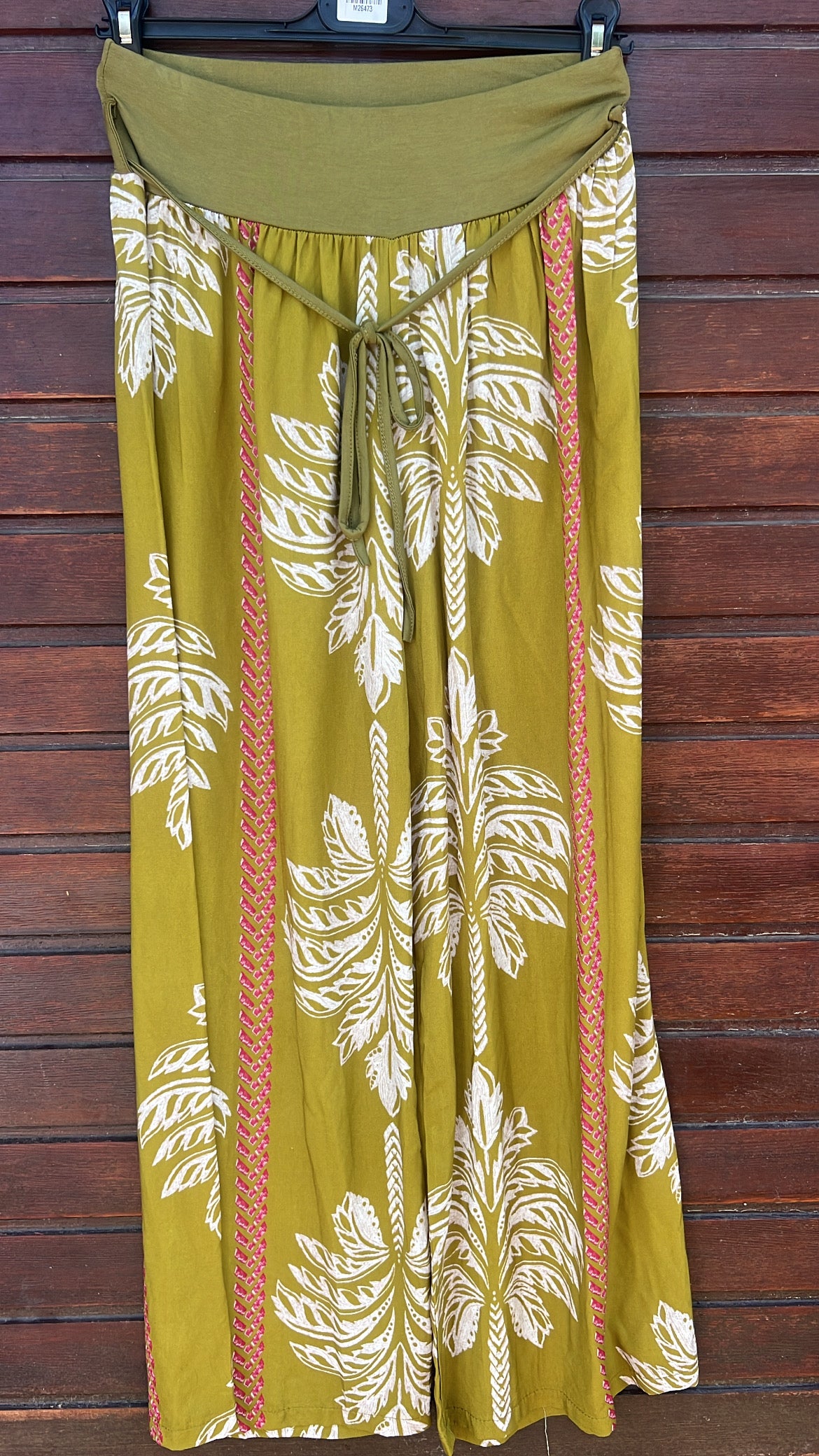 Pantalón estampado palmeras pistacho