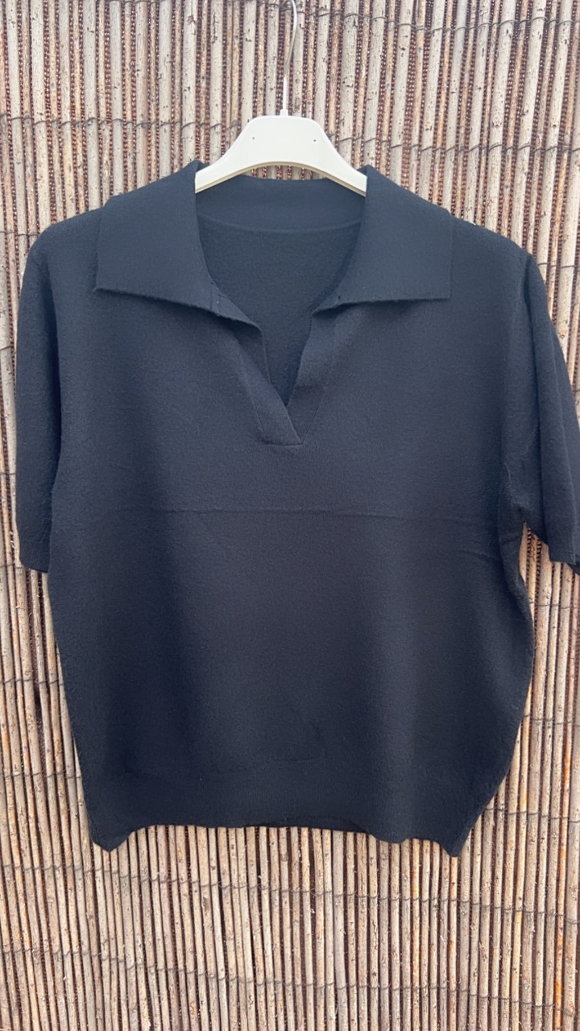 Polo negro manga corta