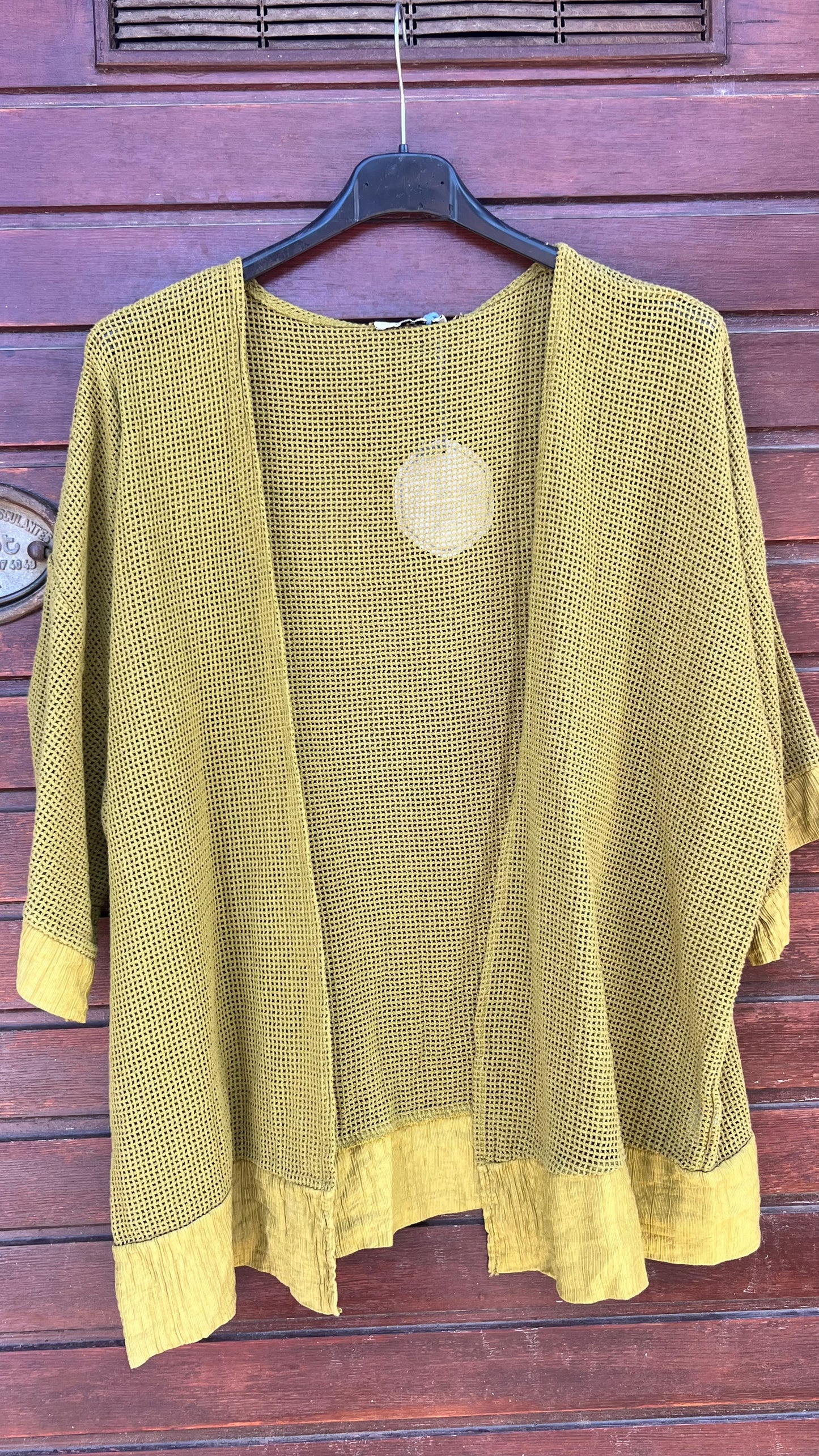 Chaqueta calada pistacho