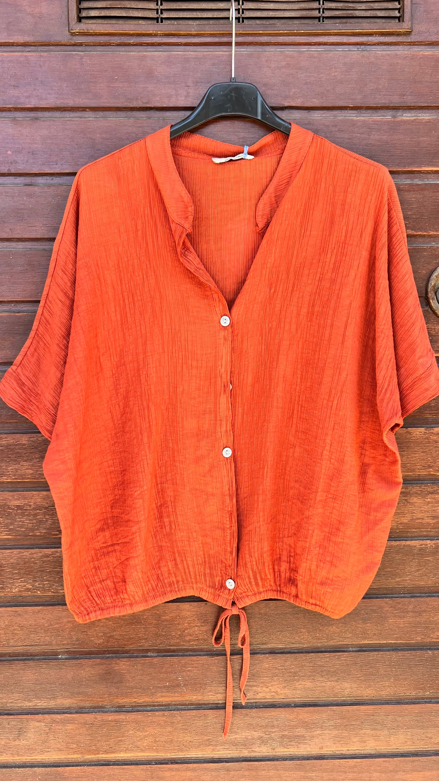 Blusa botones teja