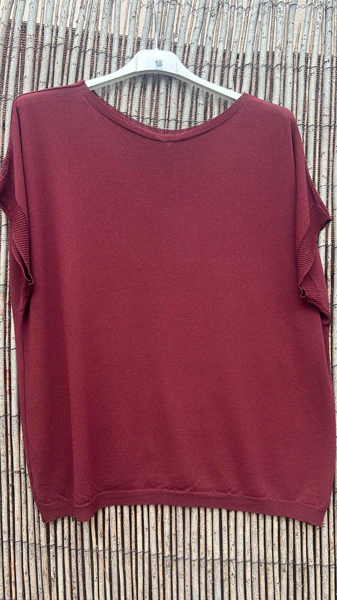 Jersey punto burdeos cuello redondo