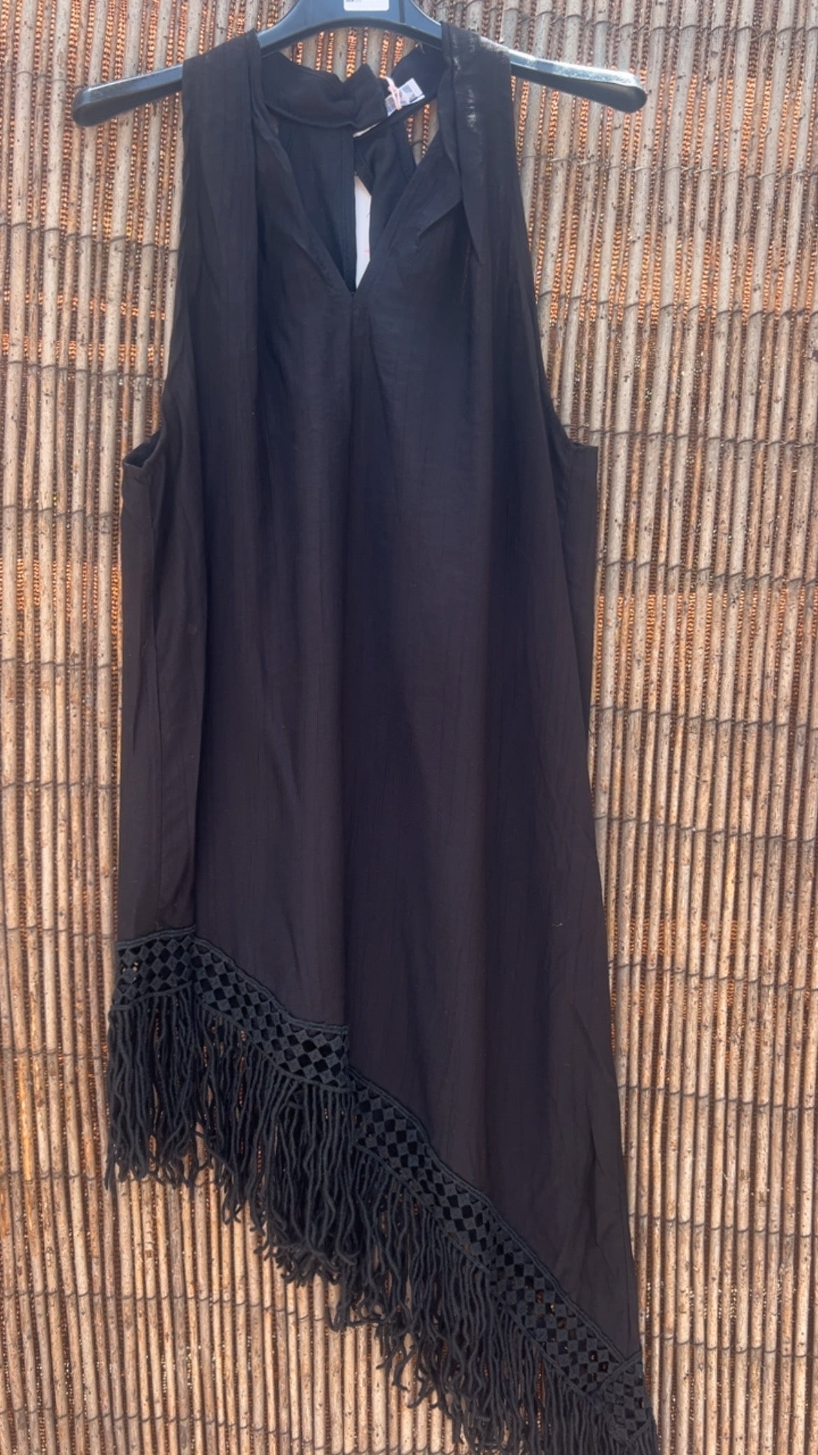 Blusa negra flecos
