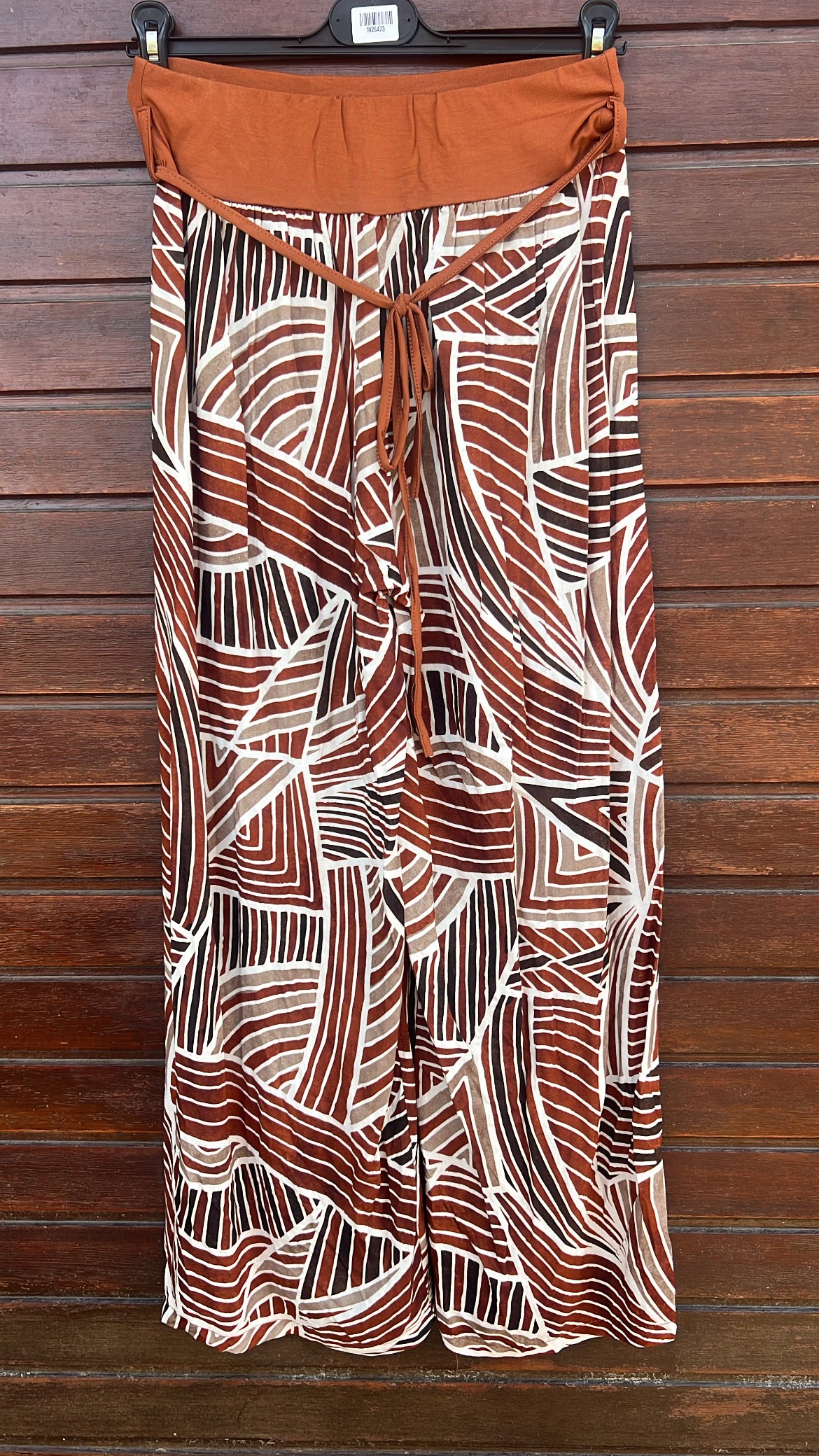 Pantalón estampado geometrico teja