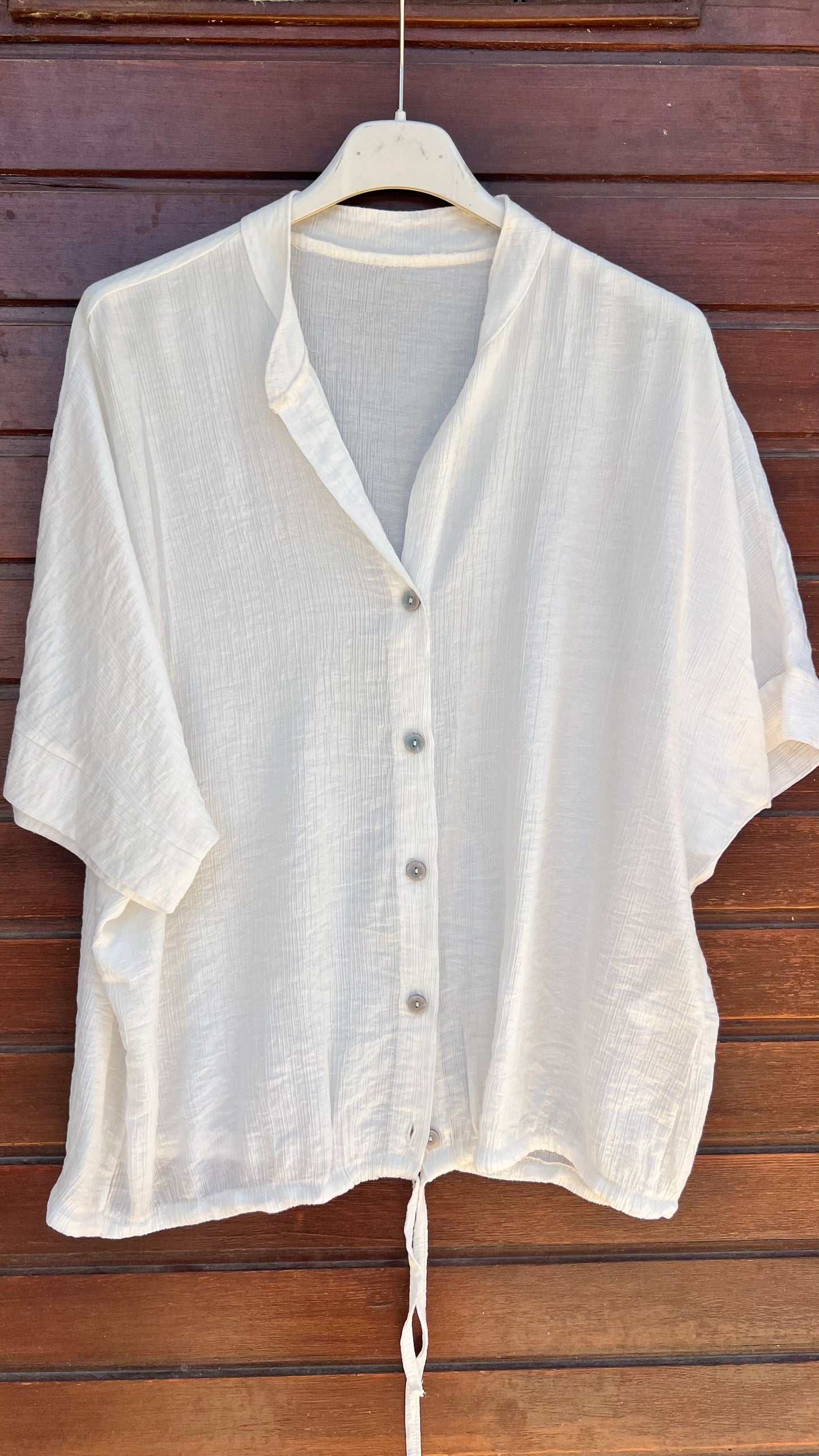 Blusa botones cruda