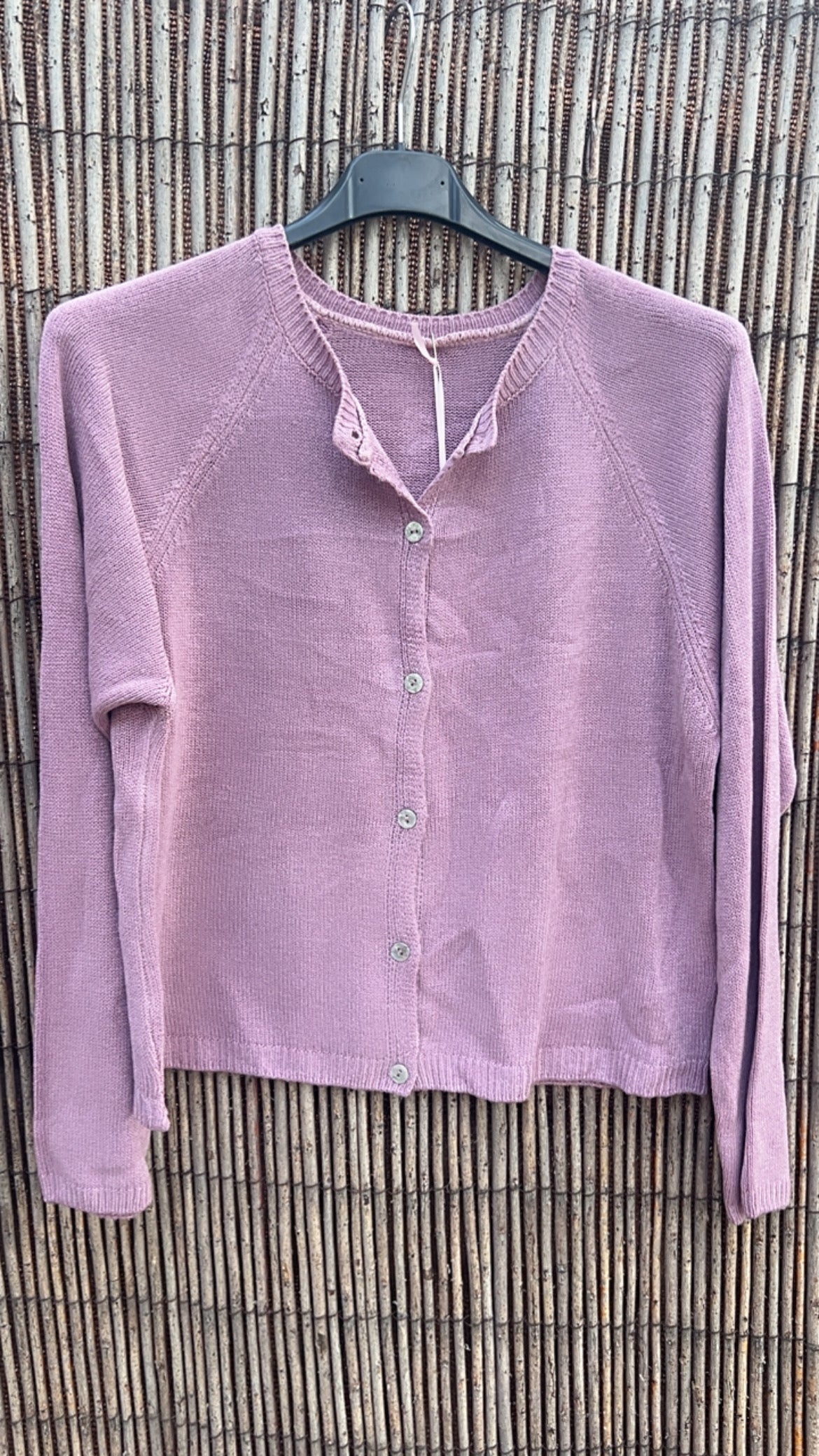 Chaqueta botones rosa