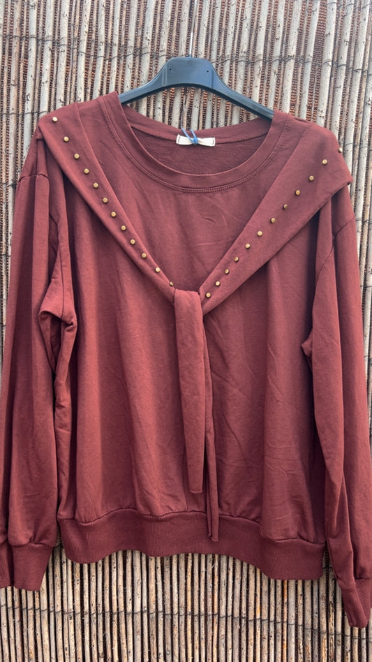 Sudadera caldera tachuelas