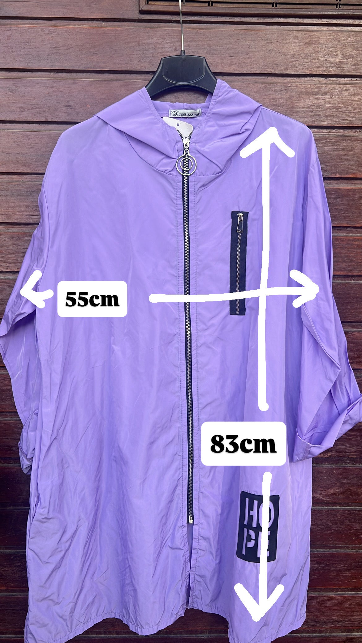 Chaqueta lila detalle cremallera