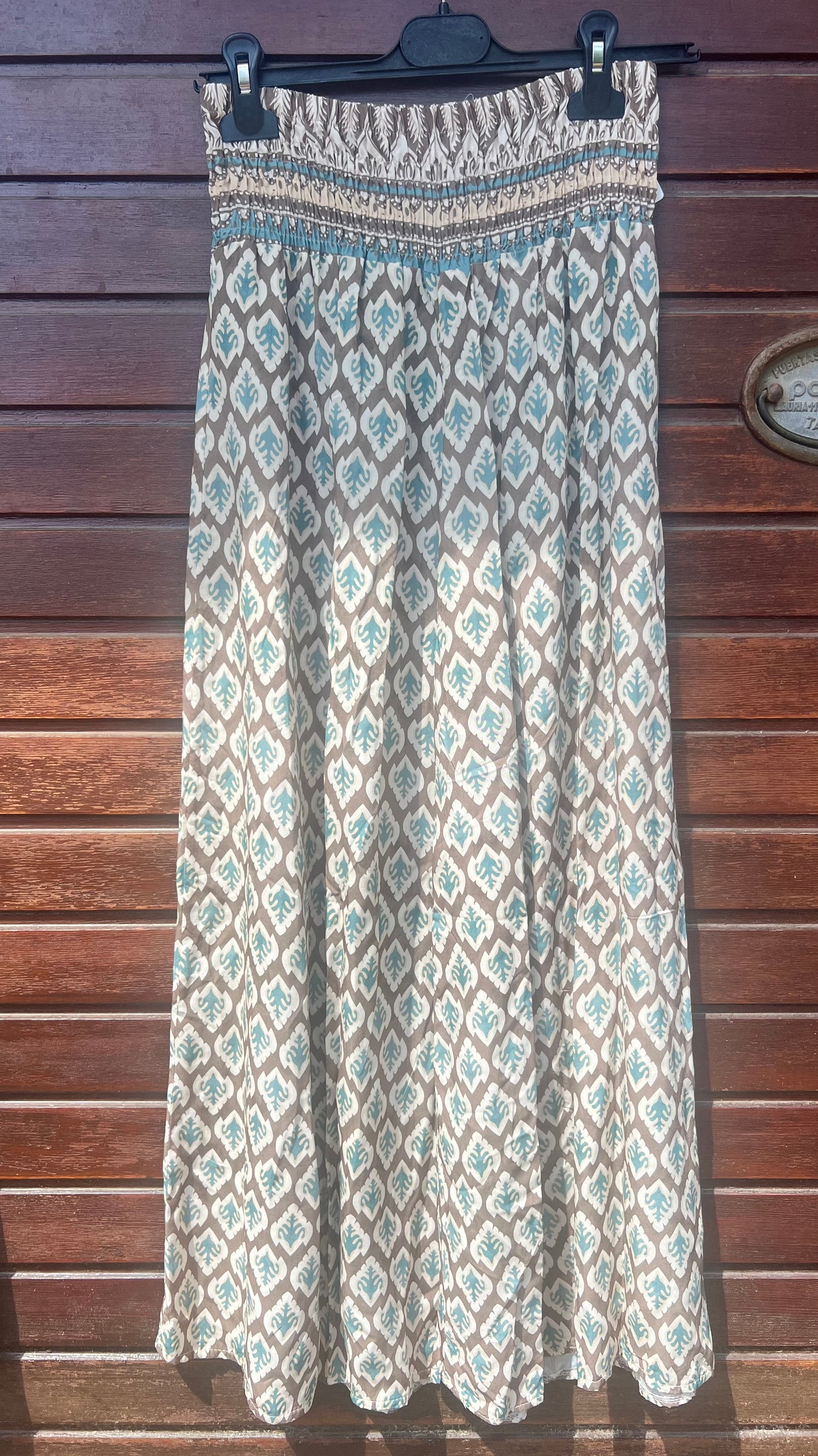 Pantalón estampado turquesa y marrón