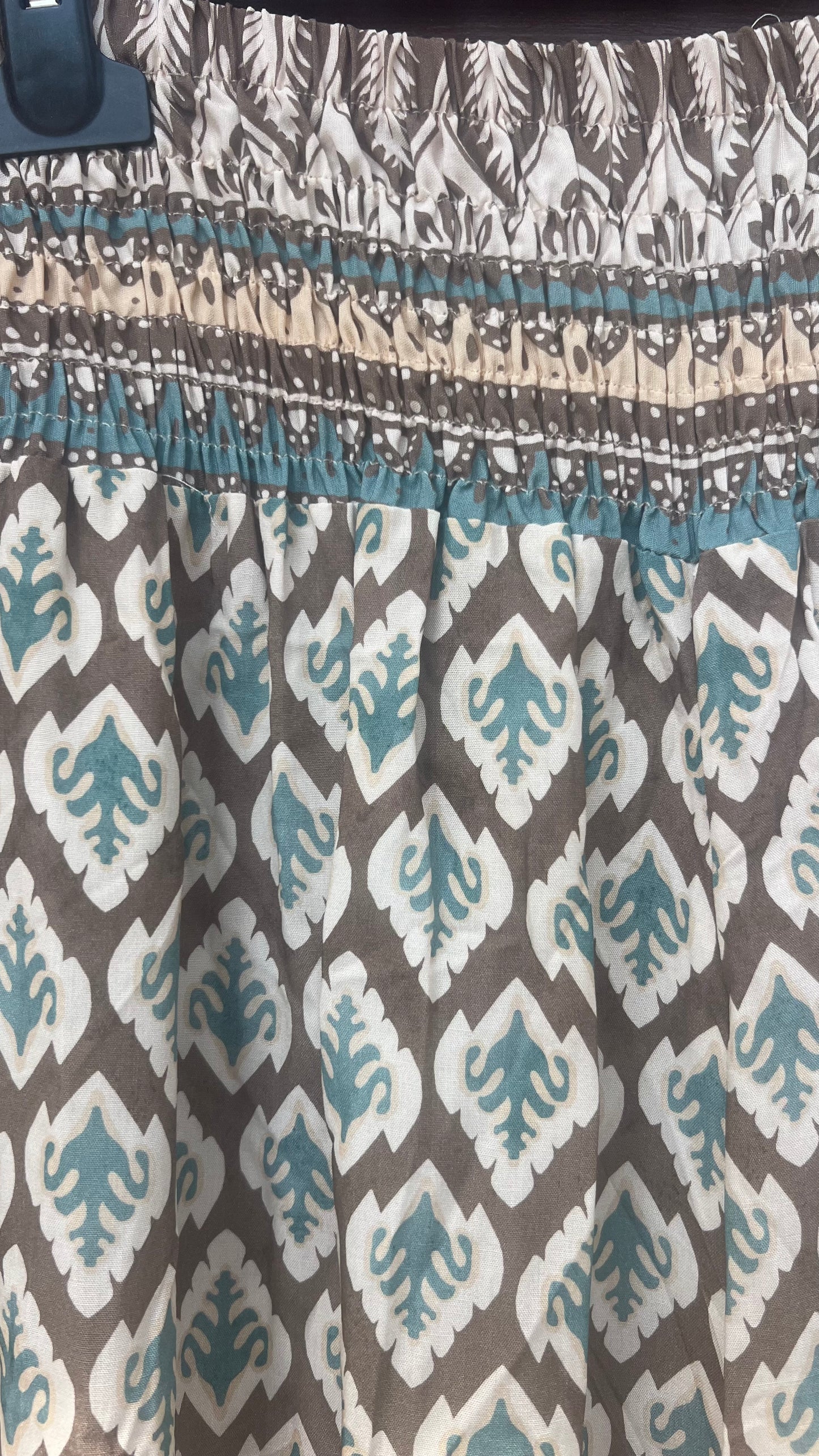 Pantalón estampado turquesa y marrón