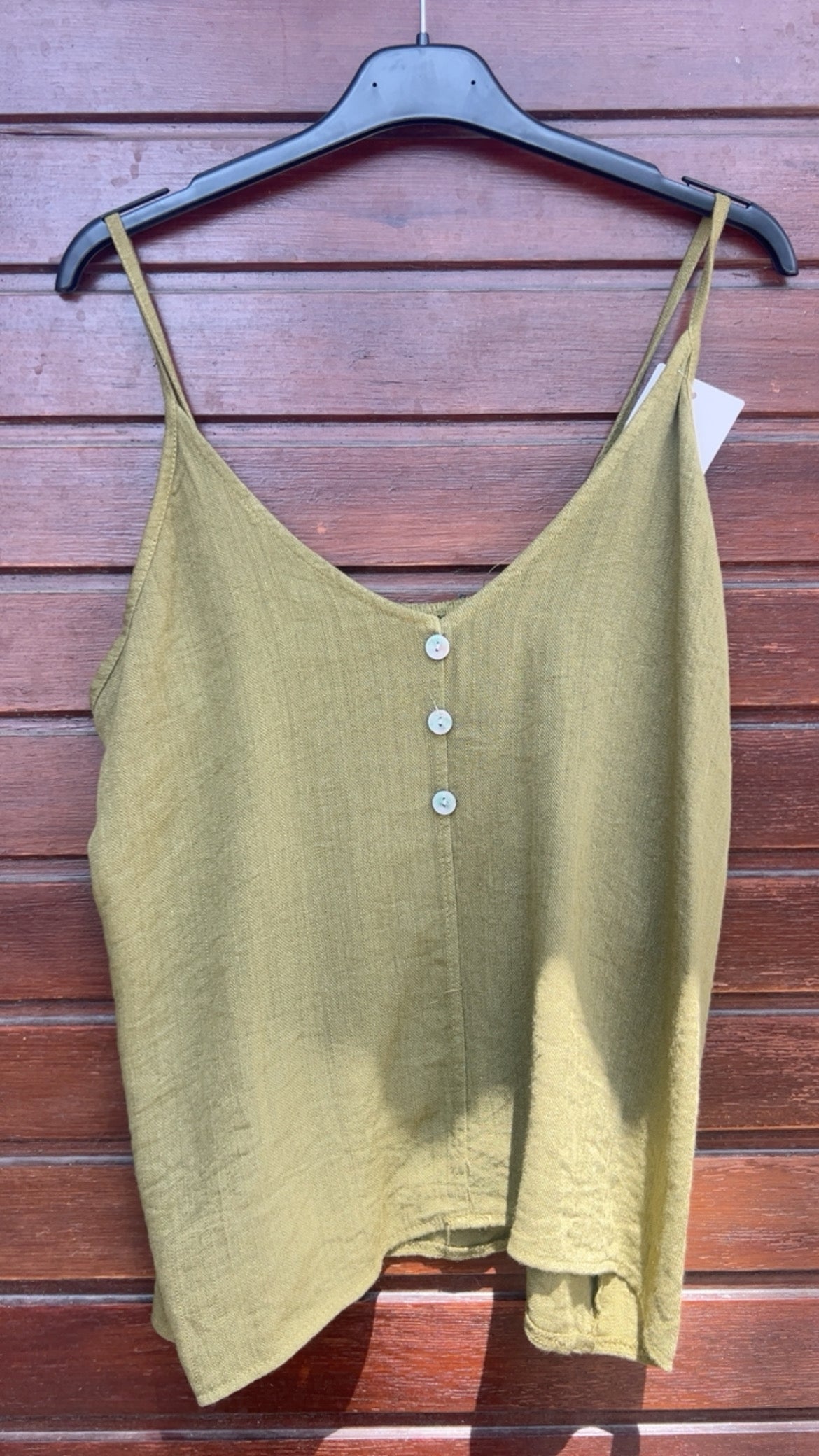 Top botones pistacho